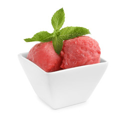 Delicious strawberry ice cream with mint in dessert bowl on white background