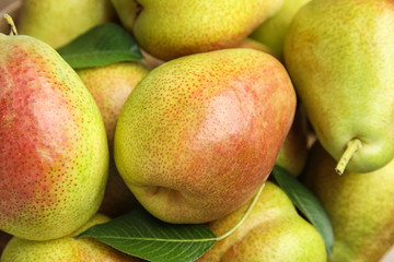 Many ripe juicy pears as background, closeup