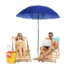 Obraz na płótnie Canvas Young couple with beach accessories on sun loungers against white background