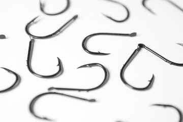 Group of fishing hooks on white background