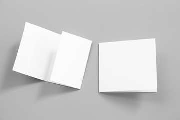 Blank portrait mock-up paper. brochure magazine isolated on gray, changeable background / white paper isolated on gray