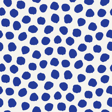 Seamless pattern. Hand drawn imperfect polka dot spot shape background. Monochrome textured dotty ink blue and white imperfect circle all over print swatch