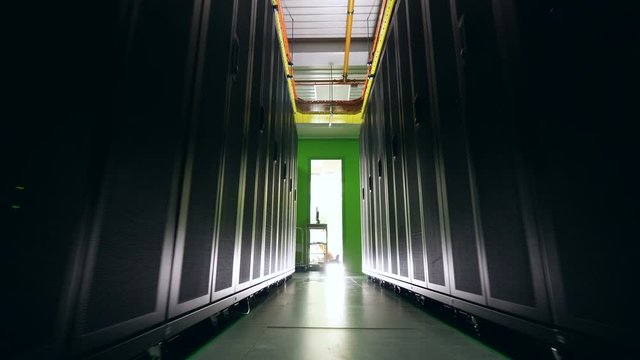Empty space between two rows of servers. Data center, data security, data ptotection, data magement, data storage, server room.