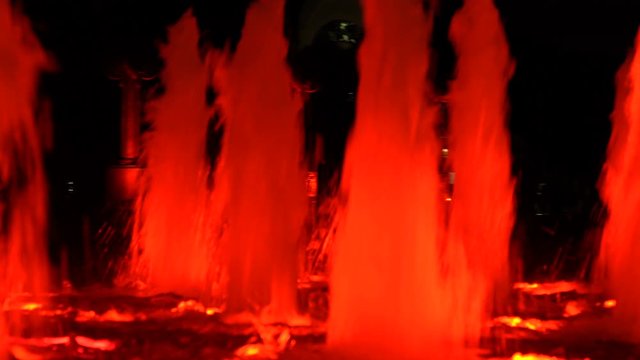 Fountains backlighted by red in Moscow, Russia