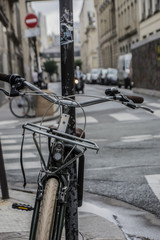Fototapeta na wymiar Bicycle on sidewalk in city