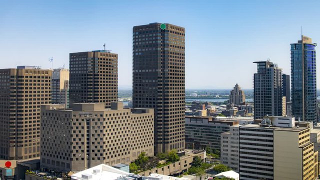 Zoom in Time lapse of Montreal downtown with cars tails filmed from Louis Boheme building, Logo Removed