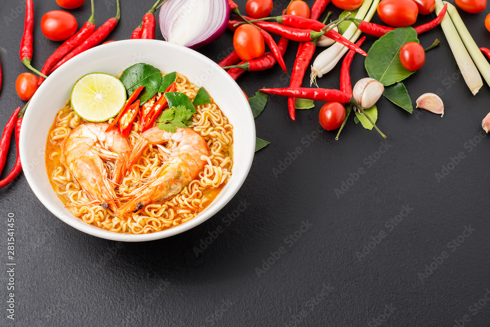 Wall mural instant noodles, tom yum kung flavor spicy, spicy flavor with thailand spices placed on the table, b