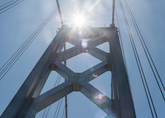 Sun shining on the tower of the Bay Bridge in San Francisco, Northern California