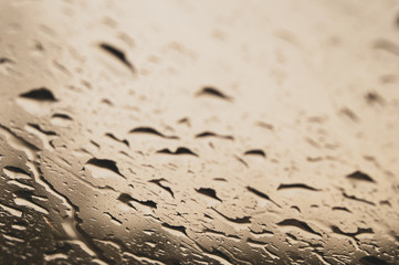 Raindrops on the window close up. rain drops on the glass macro. water drops falling down on window. rainy day