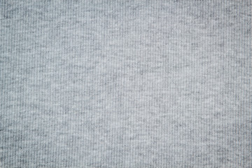 Fototapeta na wymiar Fabric knitwear black melange background texture