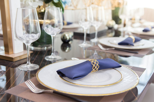 Silverware and brassware set on  Luxury Dining Table