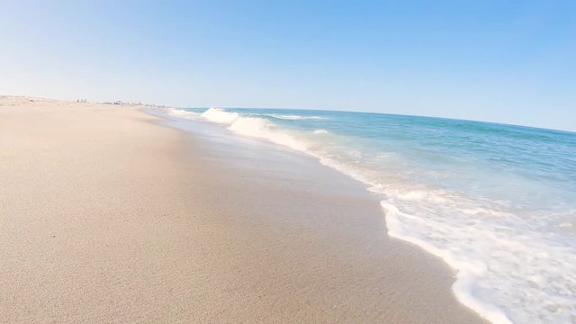 Waves hitting the beach on a popular beach during summer CAPE COD, Massachusetts, United States of America