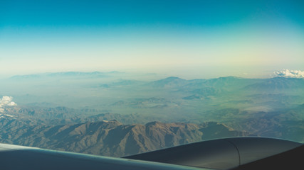 Fototapeta na wymiar mountains from an airplane window