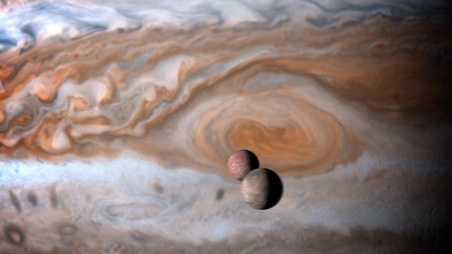 A closeup simulated satellite view of the great spot on Jupiter as two of its moons zoom past the camera in orbit.  	