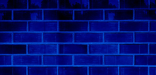Dark blue brick wall empty copy spec texture background
