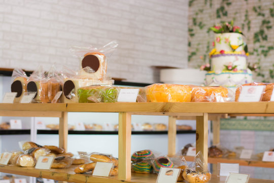 pastry shop display at wooden shelve, cookies showcase.