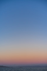 Obraz premium Sunset with a lot of sky with blues and oranges and red colors