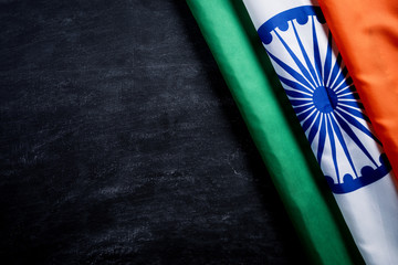 Top view of National Flag of India on blackboard background. Indian Independence Day.