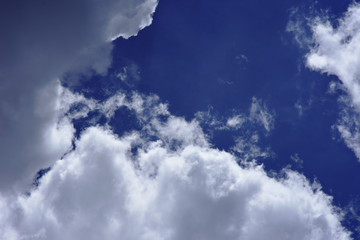 movement of white cloud over sky.