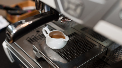 Fototapeta na wymiar black coffee morning on coffee maker