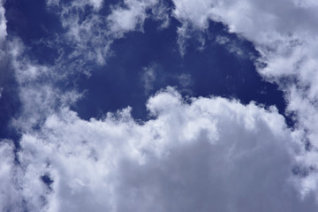 movement of white cloud over sky.