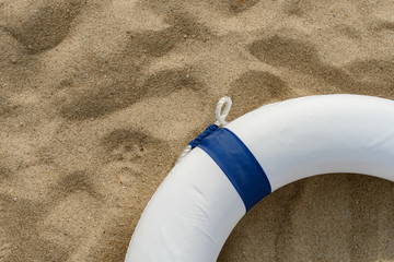 blue buoy on  sand with copy space