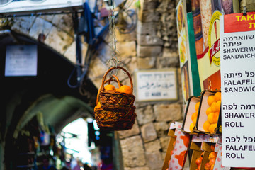 Fototapeta premium Hanging oranges in a market in Israel