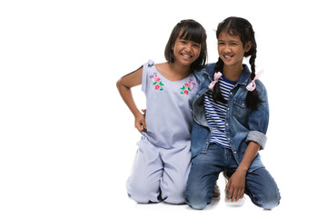 Obraz premium Photo of Two asian little girl looking at camera with smile face.