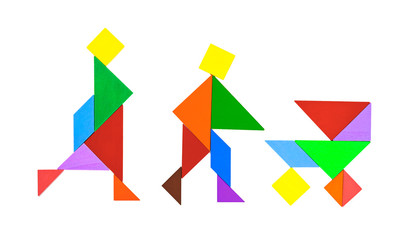 tangram shaped as couples rambling with baby in stroller on white