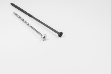 Long screws on a white background