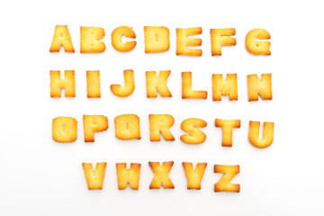 Cookie biscuits alphabet on white background