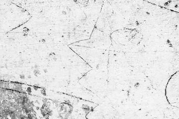 Texture of a concrete wall with cracks and scratches which can be used as a background