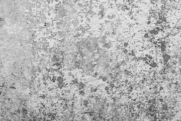 Texture of a concrete wall with cracks and scratches which can be used as a background