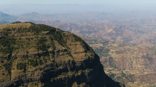 Aerial footage of cliff in Simien mountains in Ethiopia at sunset