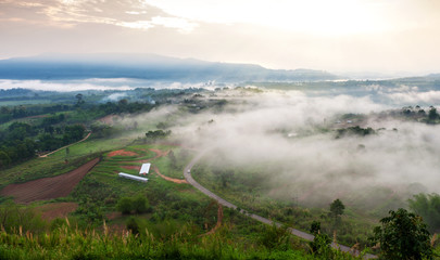 Beautiful landscape of the mountain in the fog in sunrise, sunset time at Khaotakeanngo Phetchabun province Thailand, Popular viewpoints of tourists in Phetchabun province Thailand.