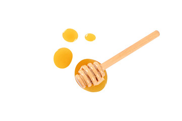 Honey  drop with dripper isolated on white background.