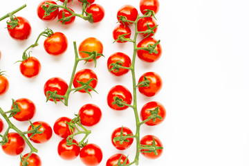 Fresh cherry tomatoes isolated on white background.