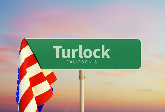 Turlock &ndash; California. Road or Town Sign. Flag of the united states. Sunset oder Sunrise Sky. 3d rendering