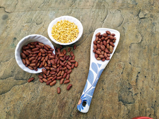 Prepared Pulses for cooking on the white bowl isolated on stone background