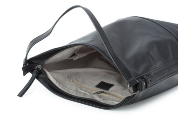 Black leather female handbag isolated on white background