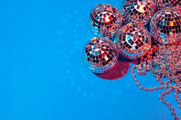 Mirror party balls put on table close up
