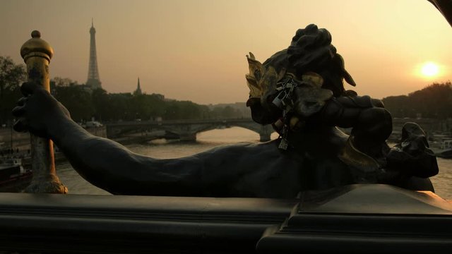 Sculpture of Nymph  on the Alexandre III Bridge at sunset in Paris