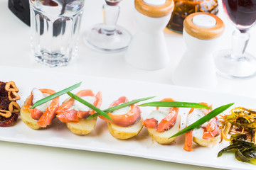 Salad of salted salmon, boiled potatoes close up