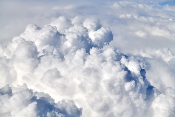 Obraz premium Take aerial photos of the sea of clouds on the plane.