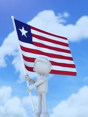 国旗を掲げるリベリアのスポーツ選手