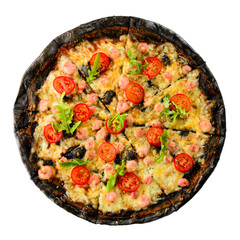 Italian pizza with black dough and seafood on a baking tray from the oven