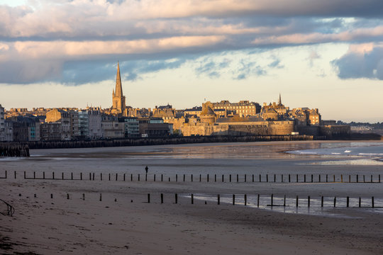 The morning light on the Plage du Sillon and walled city. Saint Malo , France, Ille et Vilaine, Emerald Coast