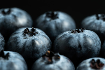 Macro view of blue ripe blueberries fruits