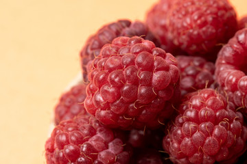 Macro view of red ripe raspberry fruits