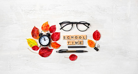 school time concept. eyeglass, pencil, clock alarm, autumn leaves. Concept of education, starting school, back to school. 1 september, beginning of school year,  teachers day